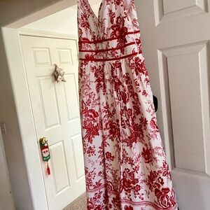 Beautiful red and white dress brand new size 6 side zipper. Ribbon appliqué